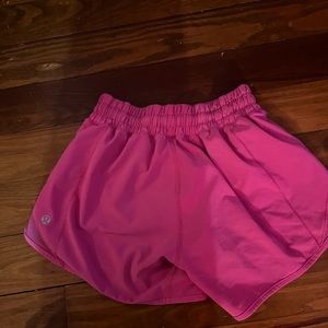 Sonic pink hotty hot 4 inch lululemon shorts size 0 been worn but no tears